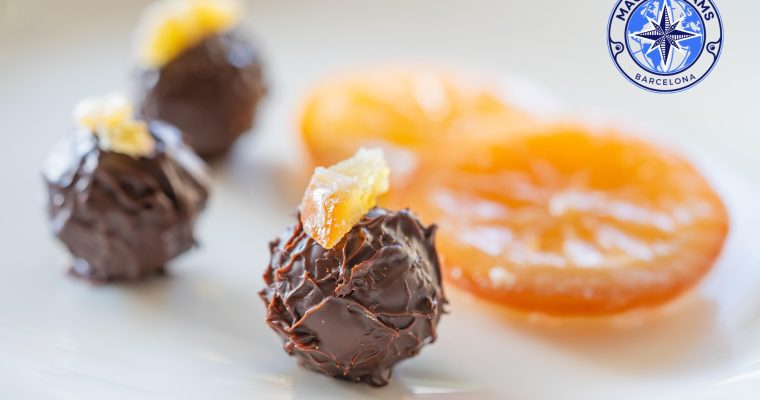 Artisanal Milk Chocolate Truffles with Candied Orange.